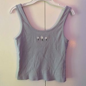 woman's baby blue crop top with flowers